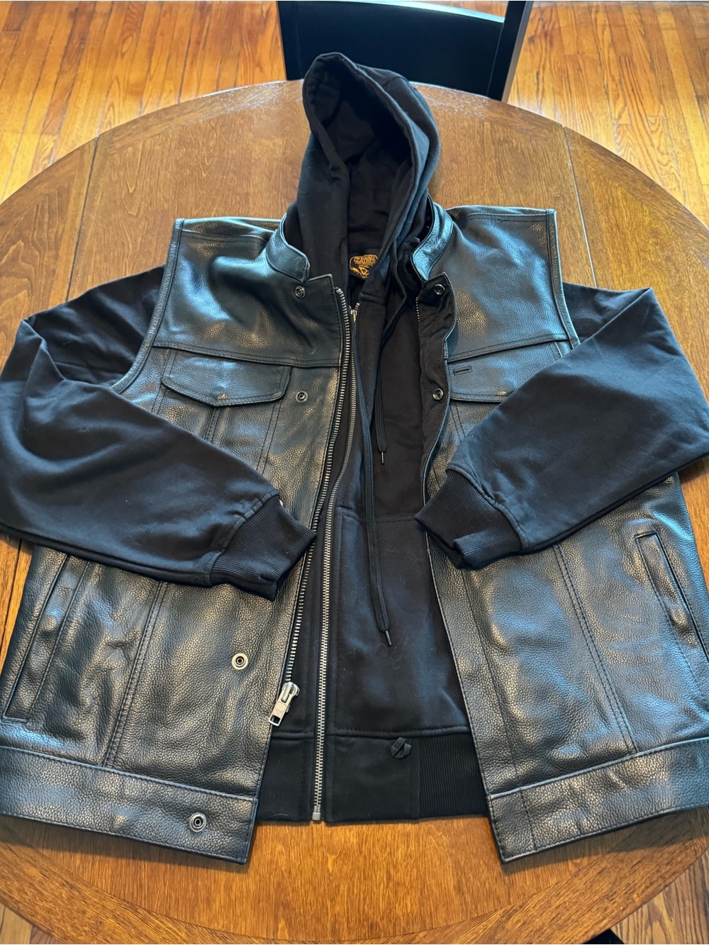 Leather vest and sweatshirt